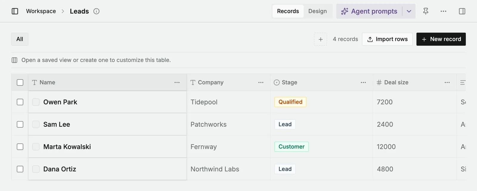 A Busabase Base called Leads with four records: name, company, stage and deal size